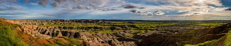Badlands National Park is located in southwestern South Dakota, featuring nearly 400 square miles of sharply eroded buttes and pinnacles, and the largest undisturbed mixed grass prairie in the United States.の写真素材