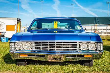 Daytona Beach, FL / USA- November 24, 2018: Blue 1967 Chevrolet Impala Coupe at the Fall 2018 Daytona Turkey Run.のeditorial素材