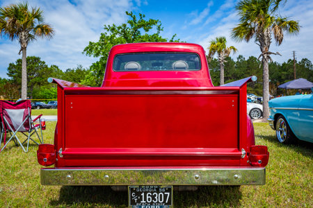 Savannah, GA / USA - April 21, 2018: 1956 Ford F100 pickup truck at a car show in Savannah, Georgia.