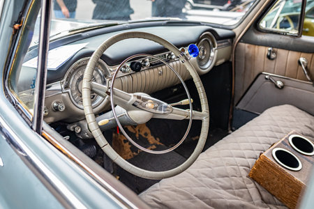 Tybee Island, GA - October 3, 2020: The 1953 Oldsmobile Super 88 sedan's unique steering wheel at a...