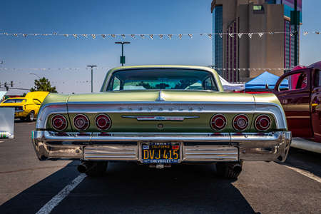 Reno, NV - August 3, 2021: 1964 Chevrolet Impala Sport Coupe at a local car show.のeditorial素材