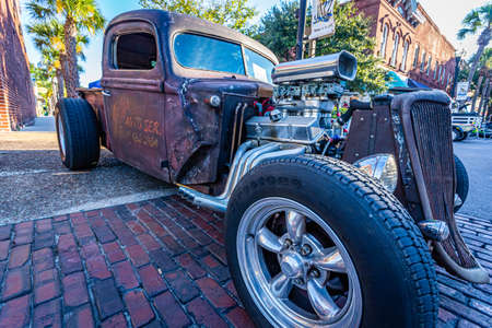 Fernandina Beach, FL - October 18, 2014: Wide Angle low perspective front corner view of a 1941 Ford pickup truck at a classic car show in Fernandina Beach, Florida.のeditorial素材