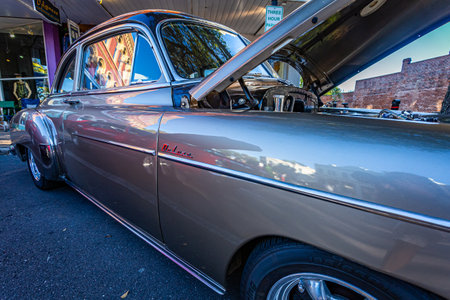 Fernandina Beach, FL - October 18, 2014: Wide angle low perspective front corner view of a 1949 Chevrolet Deluxe coupe at a classic car show in Fernandina Beach, Florida.のeditorial素材