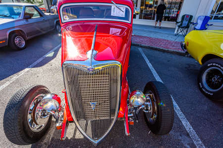 Fernandina Beach, FL - October 18, 2014: Wide angle high perspective front view of a 1934 Ford 5 Window Coupe at a classic car show in Fernandina Beach, Florida.のeditorial素材