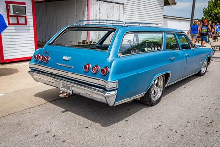 Des Moines, IA - July 02, 2022: High perspective rear corner view of a 1965 Chevrolet Impala Station Wagon at a local car show.のeditorial素材