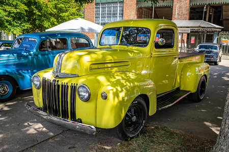 Des Moines, IA - July 03, 2022: High perspective front corner view of a 1947 Ford Half Ton Pickup Truck at a local car show.のeditorial素材