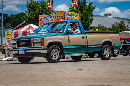 Des Moines, IA - July 03, 2022: Wide angle front corner view of a 1994 GMC Sierra C1500  Pickup Truck at a local car show.のeditorial素材