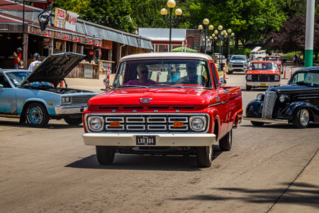 Des Moines, IA - July 03, 2022: Wide angle front view of a 1964 Ford F100 Pickup Truck at a local car showのeditorial素材