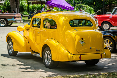 Des Moines, IA - July 03, 2022: High perspective rear corner view of a 1936 Oldsmobile F36 2 Door Sedan at a local car show.のeditorial素材