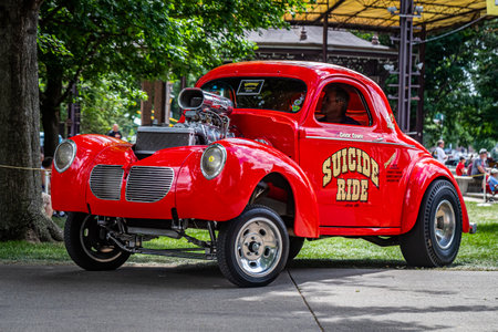 Des Moines, IA - July 03, 2022: Low perspective front corner view of a 1940 Willys Gasser Style Coupe at a local car show.のeditorial素材