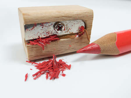 red pencil crayon in a pencil sharpener の写真素材