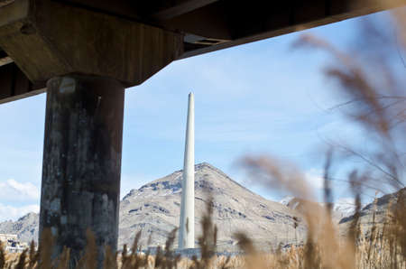 View of the smoke stack from under a highway bridge.の写真素材