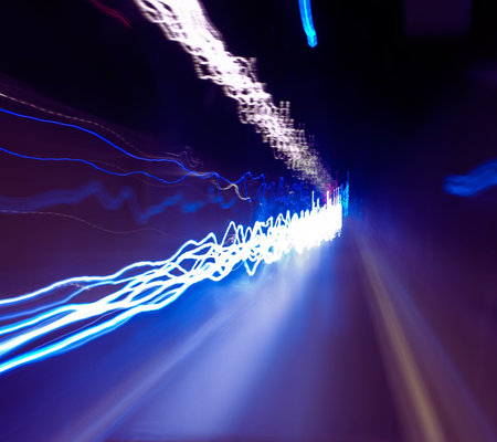 Abstract Motion Blurred Light Trails in Tunnel  Long Exposure Photo 