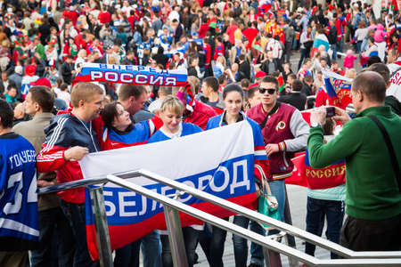 MINSK, BELARUS - MAY 9 - Russian Fans with Flags in Front of Minsk Arena on May 9, 2014 in Belarus  Ice Hockey World Championship  IIHF  Opening のeditorial素材