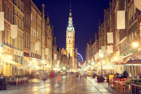 Gdansk Street with Town Hall at Night. Popular Touristic Destination at Baltic Sea in Poland,...