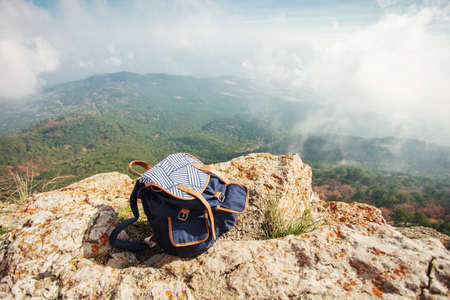 backpack on top of the mountainの写真素材