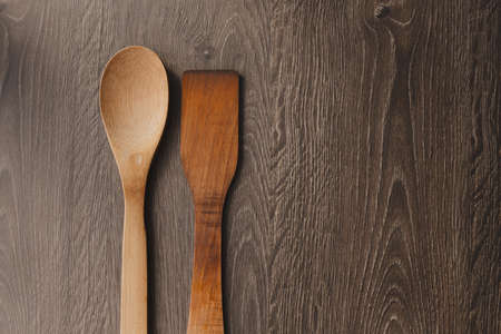 wooden kitchen accessories on old wood backgroundの写真素材