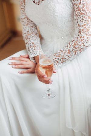 Beautiful bride. Wedding hairstyle and make up. champagneの写真素材