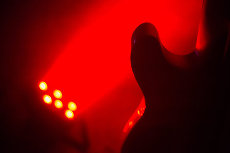 Guitarist on stage for background, soft and blur concept