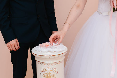 Marry me. Groom put a ring on finger of his lovely wife. Wedding couple together
