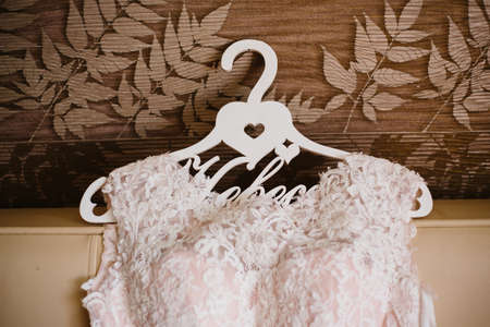 Pink Wedding dress on a shoulders, before ceremonyの写真素材