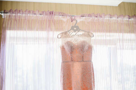 Pink Wedding dress on a shoulders, before ceremonyの写真素材