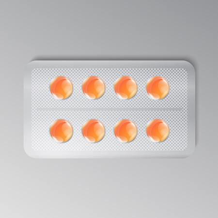 Set of the orange pills in package. Vector realistic medicine illustration.のイラスト素材