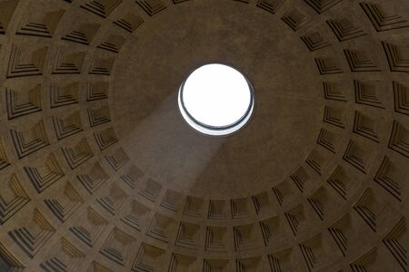 sunlight shining through the Oculus, in the Pantheon in Rome, Italyの写真素材