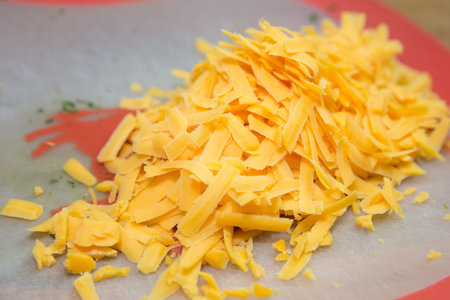 Pile of Yellow Cheddar Cheeseの写真素材