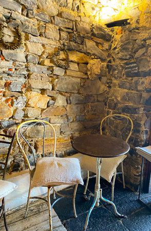 Lake Como, Italy, table and chairs in a cafeの写真素材