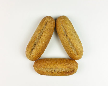 Whole bread on white background - top view
