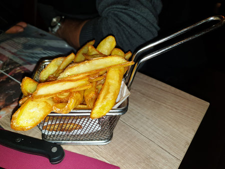 French fries served in the fryer basket