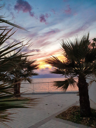 cloudy sky and red sunset on the seaの写真素材