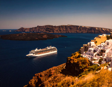 Cruise ship in Santorini island, Greece at sunset.の素材