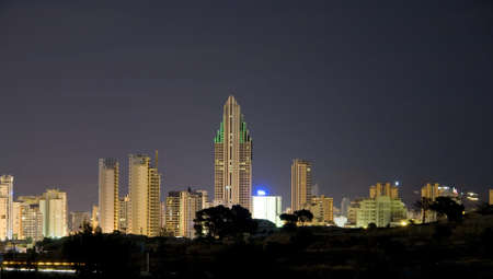 Long exposure shot - the skyline of Benidorm, with the second largest skyscraper of Spain, Gran Bali in the centerの写真素材