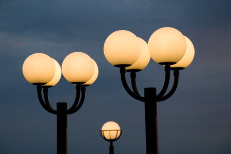 Early Morning Before Sunrise - Lanterns Agains Dark Cloudy Skyの写真素材