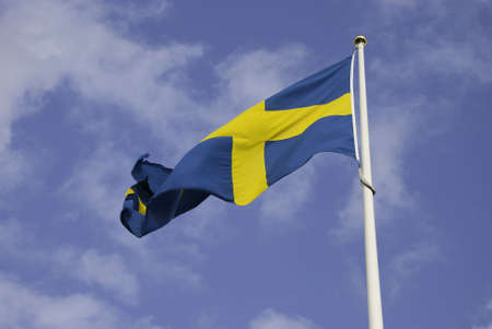 Big Swedish Flag and Windy Weatherの写真素材