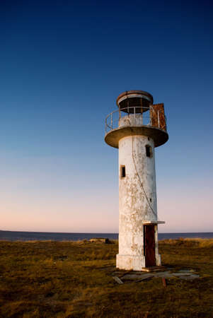 Old White Watchtower Near Seaの写真素材