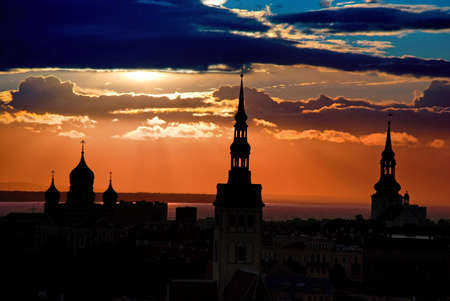 August Sunset over City (Tallinn, Estonia) - Building Silhouettes and Colorful Skyの写真素材
