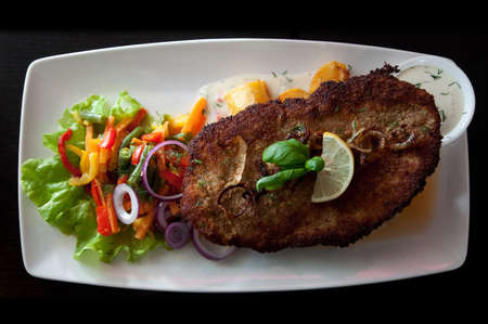 Restaurant - Meal - Pork With Baked Potatoes and Saladの写真素材