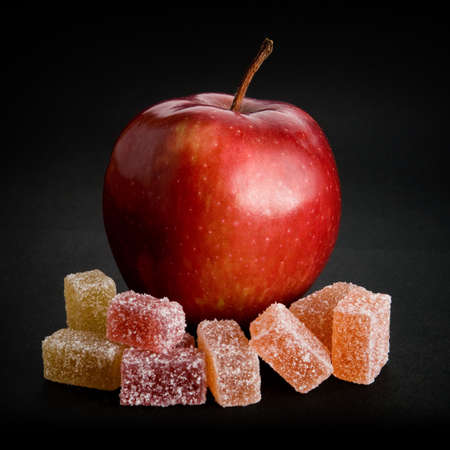 Red Apple with selection of marmeladeの写真素材