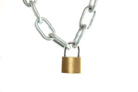 a padlock holding a silver chainの写真素材