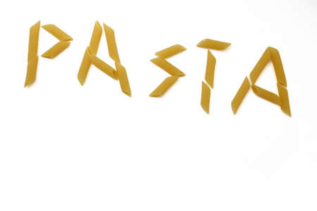 The word pasta consisting of real pasta with white backgroundの写真素材