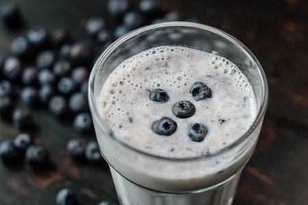 blueberry smoothie and fresh berry on the dark background. concept healthy eating.の写真素材