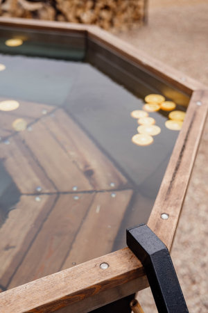 Modern large barrel outdoors in the middle of the forest. Soothing warm water.の写真素材