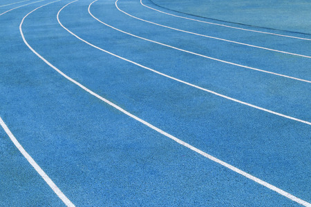 Fragment of blue surface of running tracksの写真素材