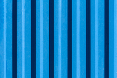 Metallic rippled surface of blue color (texture, background)の写真素材