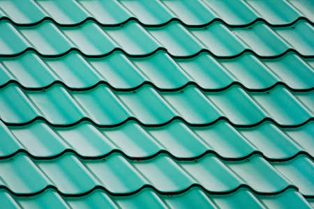 metal tile roof surface as background, texture, abstractの写真素材