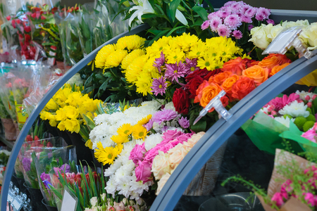 Counter with bouquets of flowers in the shopの写真素材
