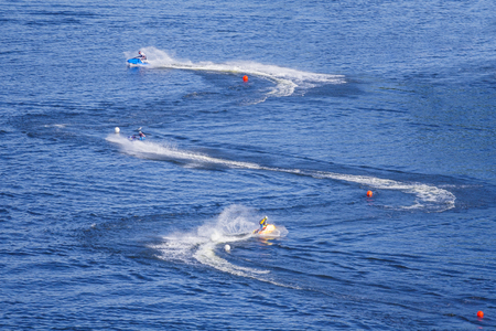 Moscow, Russia, june 2018: Aerial view of jet-ski race on the blue water (editorial)のeditorial素材